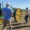 Land owner, Jerry Rovey (in baseball cap), showing his 1929 John Deere tractor