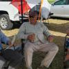 Dave Semenaro, Tom Arnold, and Henry Toews sitting out in the wind