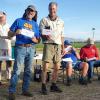 Walter Ainslie and Dave Wagner get envelopes with their event standings